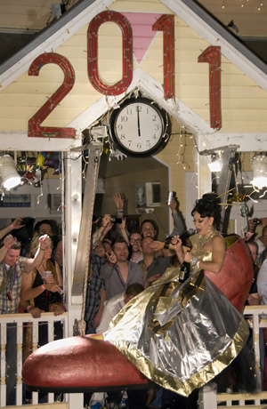 Image 1 - Each year perched in a super-sized red high heel, Sushi is lowered from the balcony of the Bourbon St. complex to ring in the new year. Photo by Andy Newman/Florida Keys News Bureau